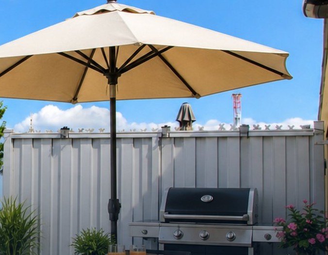 Private rooftop terrace with umbrella and barbecue