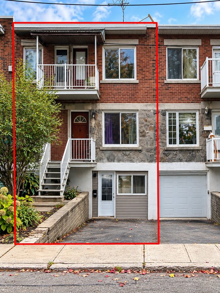 Brick triplex, the building outlined in red